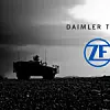 Gepanzertes Militärfahrzeug auf steinigem Wüstenboden bei dramatischem Himmel mit Logos von Daimler Truck und ZF.
