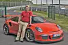 Redakteur Marcel Sommer mit dem respekteinflößenden Porsche 911 GT3 RS.