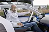 Dieter Zetsche in einem Mercedes EQ